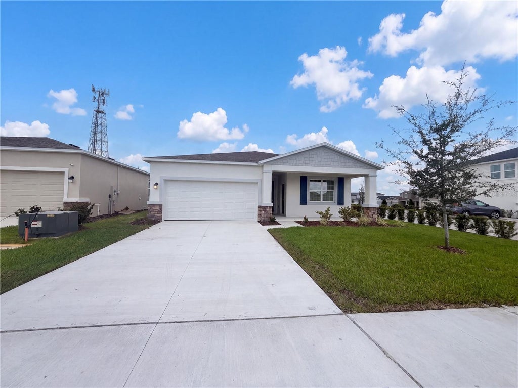 Photo of 1520 Redwood Lane #M, Haines City, FL 33844 (MLS # O6443180)