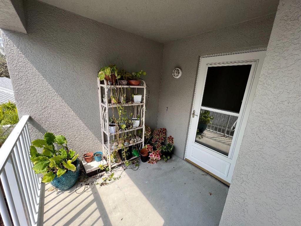 Photo of 9485 Hamlin Boulevard #8, Seminole, FL 33776 (MLS # W7886088)
