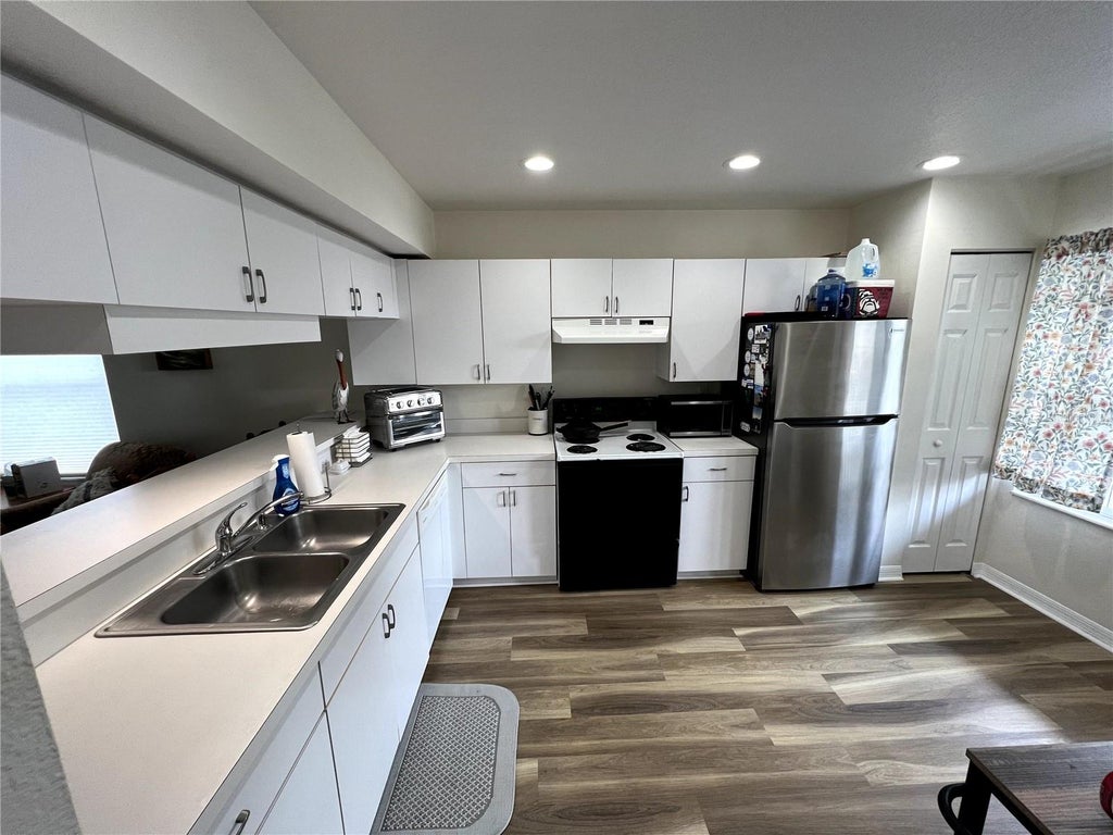 Photo of 9485 Hamlin Boulevard #8, Seminole, FL 33776 (MLS # W7886088)