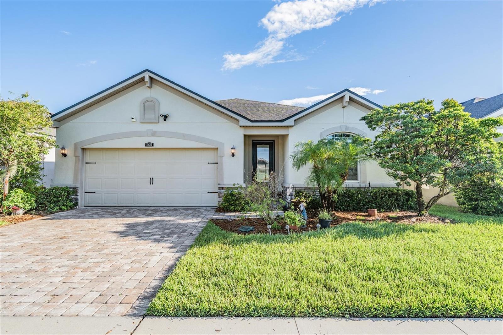 Welcome to the resort style, gated community of Boyette Park in Riverview! This beautifully maintained 3 bedroom, 2 bathroom rental also features a dedicated home office, perfect for remote work or creative space. Double pane, hurricane proof windows and sliders give you peace of mind as well as security cameras and lights. Step inside to an open floor plan enhanced by wood-look tile flooring throughout the main living areas. The spacious great room seamlessly connects to the gourmet kitchen, which boasts stainless steel appliances, 42" cabinets, granite countertops, and a large center island ideal for meal prep or casual dining. All bedrooms offer comfortable living space, and the primary suite is a true retreat with a large walk-in closet and a luxurious ensuite bathroom featuring dual vanities, a soaking tub, and a walk-in shower. Step out back to enjoy the fully fenced backyard and covered patio, perfect for relaxing evenings or weekend BBQs. The spacious two car garage features plenty of built in storage for maximizing space. Residents of Boyette Park enjoy exclusive access to resort-style amenities, including a sparkling community pool, open air pavilion, fire pit, playground, and grilling stations. With close proximity to shopping, dining, and easy access to major highways, you don’t want to let this amazing home pass you by!