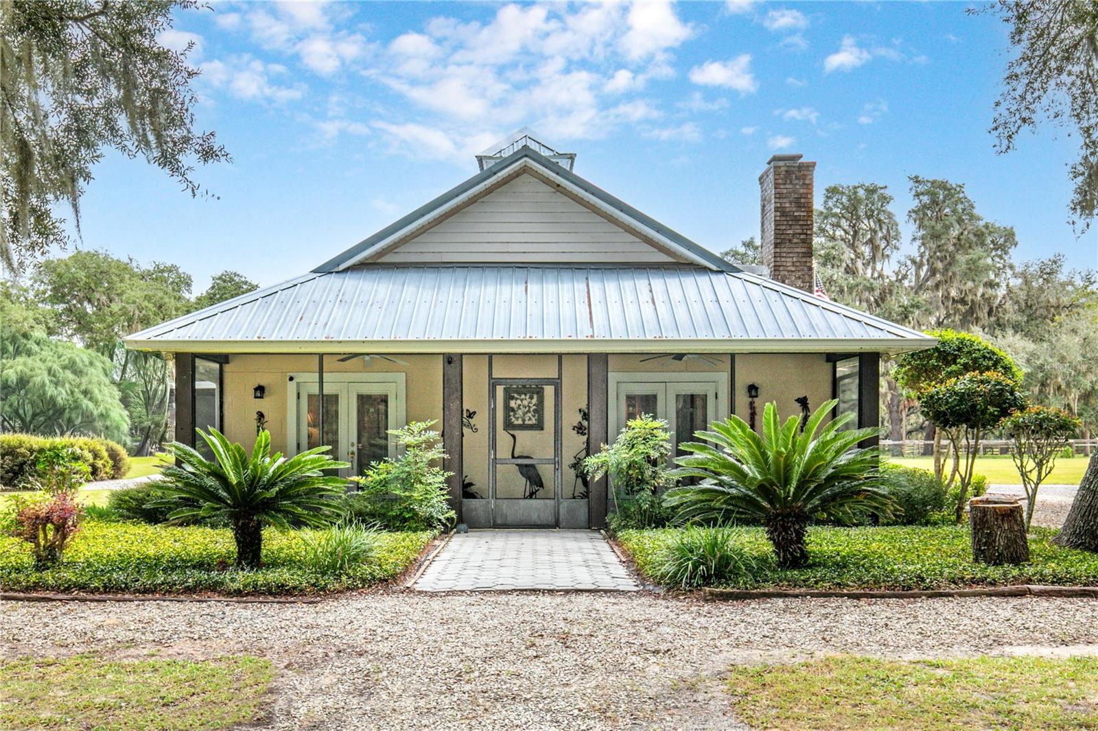 Private 10-Acres of rolling acreage with Barn, RV Pad & Endless Potential. Once in a while you find that tranquil property that is so inviting that it must be seen in person to appreciate the possibilities it offers.
Set on 10 pristine acres of towering oaks and manicured pastures, this one-of-a-kind property offers unmatched privacy, serenity, and opportunity.
The main home currently features just under 1,000 sq. ft. of finished living space, with an additional 1,000 sq. ft. already integrated and easily converted—bringing the home’s potential to approximately 2,000 sq. ft. with minimal effort. Designed for comfort and efficiency, the home includes a commercial-grade AC system, heavy insulation, and four screened lanais—each offering a unique and tranquil view of the property’s natural beauty.
Outdoors, you’ll find fruit trees, a full hookup RV pad, and a spacious storage garage. The impressive 36x48x14 barn is fully insulated, air-conditioned, and built for versatility, featuring heavy-duty concrete for a lift, 110 amp service, and dual high-lift garage doors—perfect for a workshop, car enthusiast, or agricultural use.
With multiple fenced pastures, this property is ideal for horses, cattle, or any livestock of your choice.
This is more than a property—it’s a lifestyle. Rarely does an estate offer such peace, privacy, and potential all in one place.
Don’t miss your chance to own this truly unique piece of paradise!