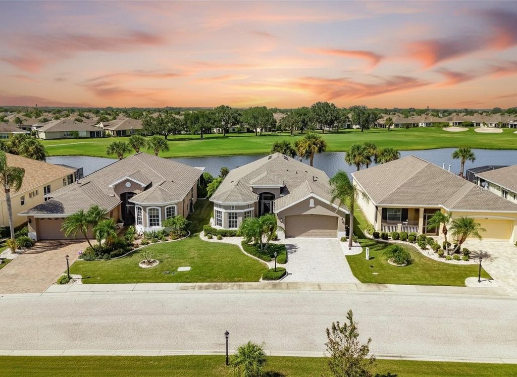 Photo of 1039 Emerald Dunes Drive, Sun City Center, FL 33573 (MLS # TB8497975)