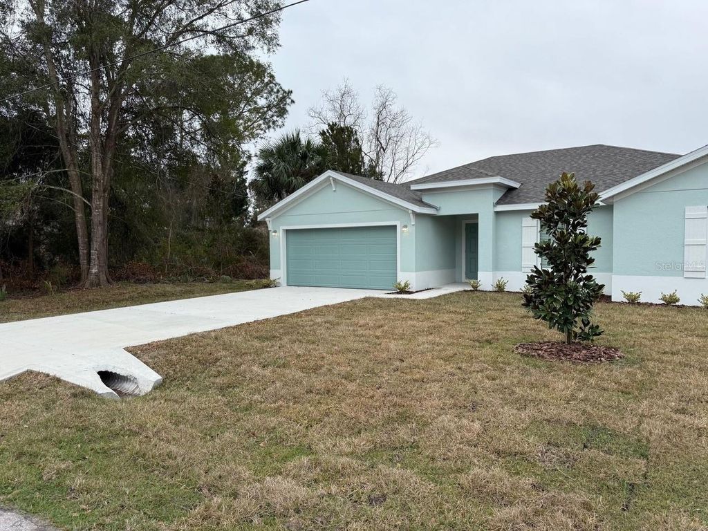 Photo of 8 Bird Tree Place, Palm Coast, FL 32137 (MLS # TB8468662)