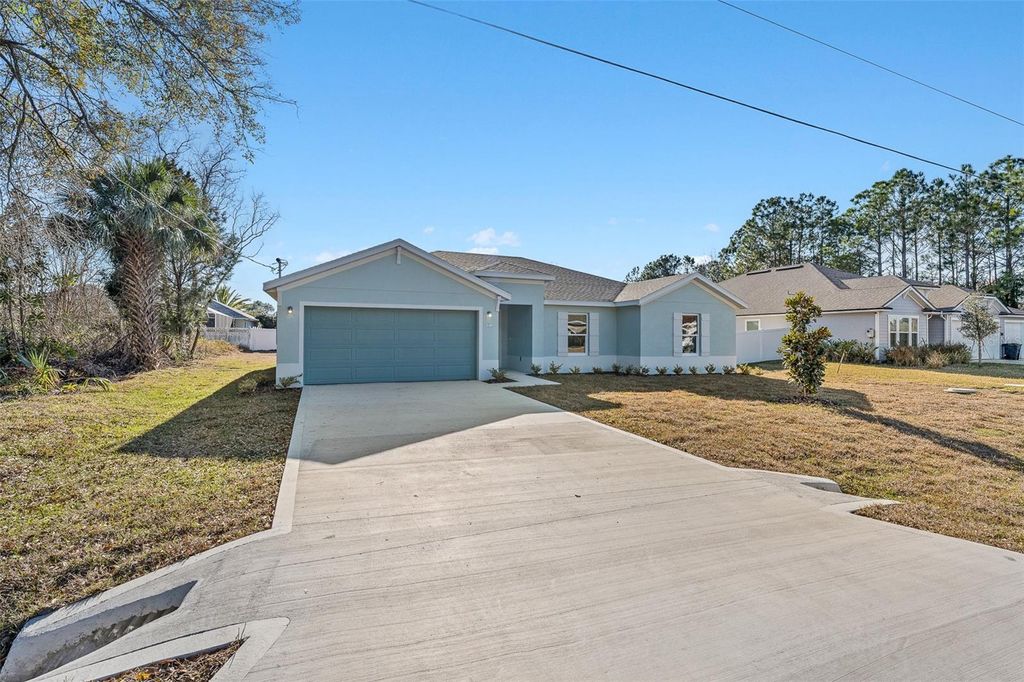 Photo of 8 Bird Tree Place, Palm Coast, FL 32137 (MLS # TB8468662)