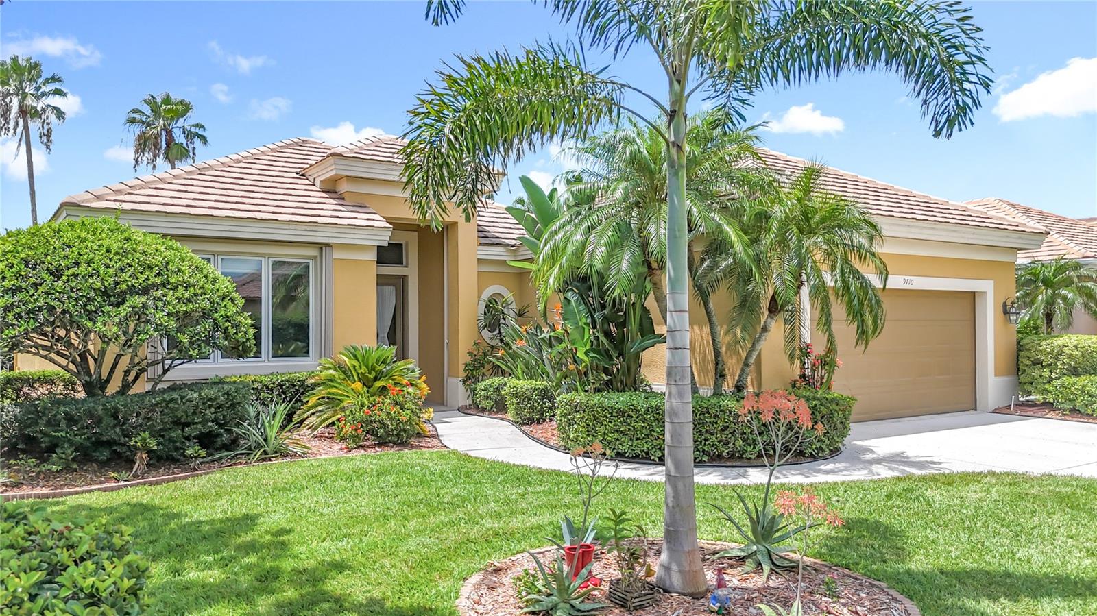 Welcome to Florida Resort style Living within the Prestigious Rosedale Golf & Country Club gated
community. Step inside this beautiful 2Bed,2Bath+Den home to the spacious experience of 12' soaring
ceilings and open concept design. Custom window dressings and shades adorn all windows and glass
doors as wonderful views of nature are invited into the home with an abundance of light. The open floor
plan Kitchen and Walk-in Pantry are complemented by new SS appliances offering inspiration to culinary
dreams and the enjoyment of entertaining hungry guests. Exit the Kitchen to your Private Courtyard
perfect for morning coffee, afternoon grilling (gas grill connection) or private sunning while immersed in
natures greenery. The spacious Living/Dining area opens to a 28' gas & solar heated pool facing south for
optimum shade cover during summer while enjoying serene views of water and palms. Additional features
include retractable storm curtains for all entrances and windows, a custom speaker system in home &
lanai and a 2 car, 1 golf cart garage.
Rosedale is a NON-CDD community with OPTIONAL Country Club Membership granting access to the 18
hole Championship Golf Course, Jr size Olympic Swimming Pool, 5 Har-Tru Tennis Courts, Fitness &
Wellness Center and Full Service Club House for dining and social activities. Rosedale is a short drive from
the Arts & Activities of the Sarasota/Bradenton area and a 35min drive from the beautiful beaches of Anna
Maria Island.
Rosedale HOA fees include such services as Exterior House Painting, Roof Washing, North & South
Manned Security Gates, Common area Maintenance, Mailboxes, Lawn fertilizing-Edging-Mowing, Hedge
Trimming, Tall Palm Tree Trimming, Mulching and Wi-fi & Cable services.
the Rosedale resident experience is a maintenance free lifestyle in a meticulously maintained community.
Come and discover why this home in Rosedale Lakewood Ranch can be the perfect spot to enjoy Resort
Vacation Style Living 365 days a year.