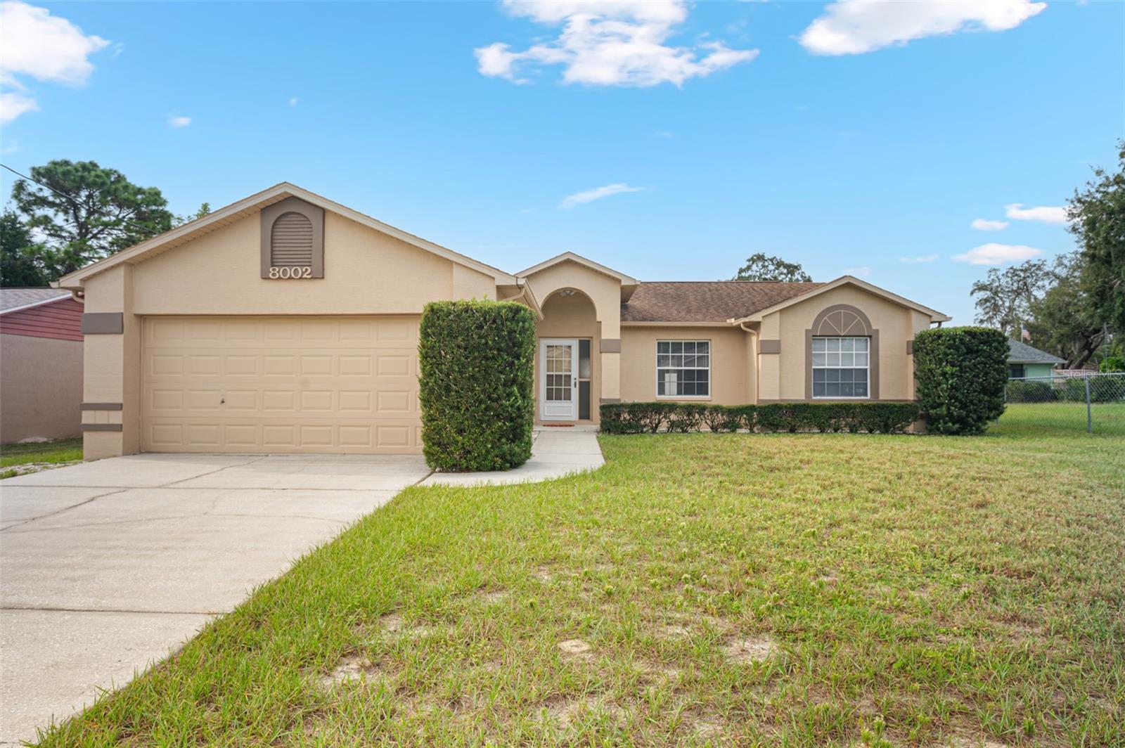 Turn-key, Move in Ready! FRESHLY PAINTED Interior and Exterior! NEW FLOORING all throughout. NO CARPET!! Check out this 3 bedroom, 2 bathroom, 2-car garage home where there is NO HOA and NO FLOOD ZONE. Open Floor Plan with High Ceilings!! Split Bedroom Floor Plan for privacy. Very spacious bathrooms. HVAC 2019. ROOF 2011. Completely Fenced In Backyard! Enclosed Patio for to enjoy your morning coffee or those warm Florida days/nights. No rear neighbors. Be at Weeki Wachee Springs State Park in less than 10 minutes. Right off US-19 for easy access to nearby cities like: Crystal River, Clearwater, and New Port Richey.