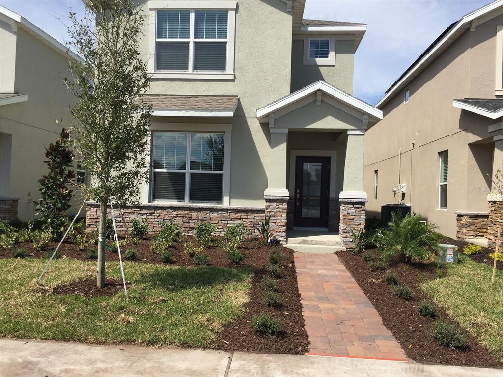 Photo of 12076 Theme Alley, Orlando, FL 32832 (MLS # O6387318)