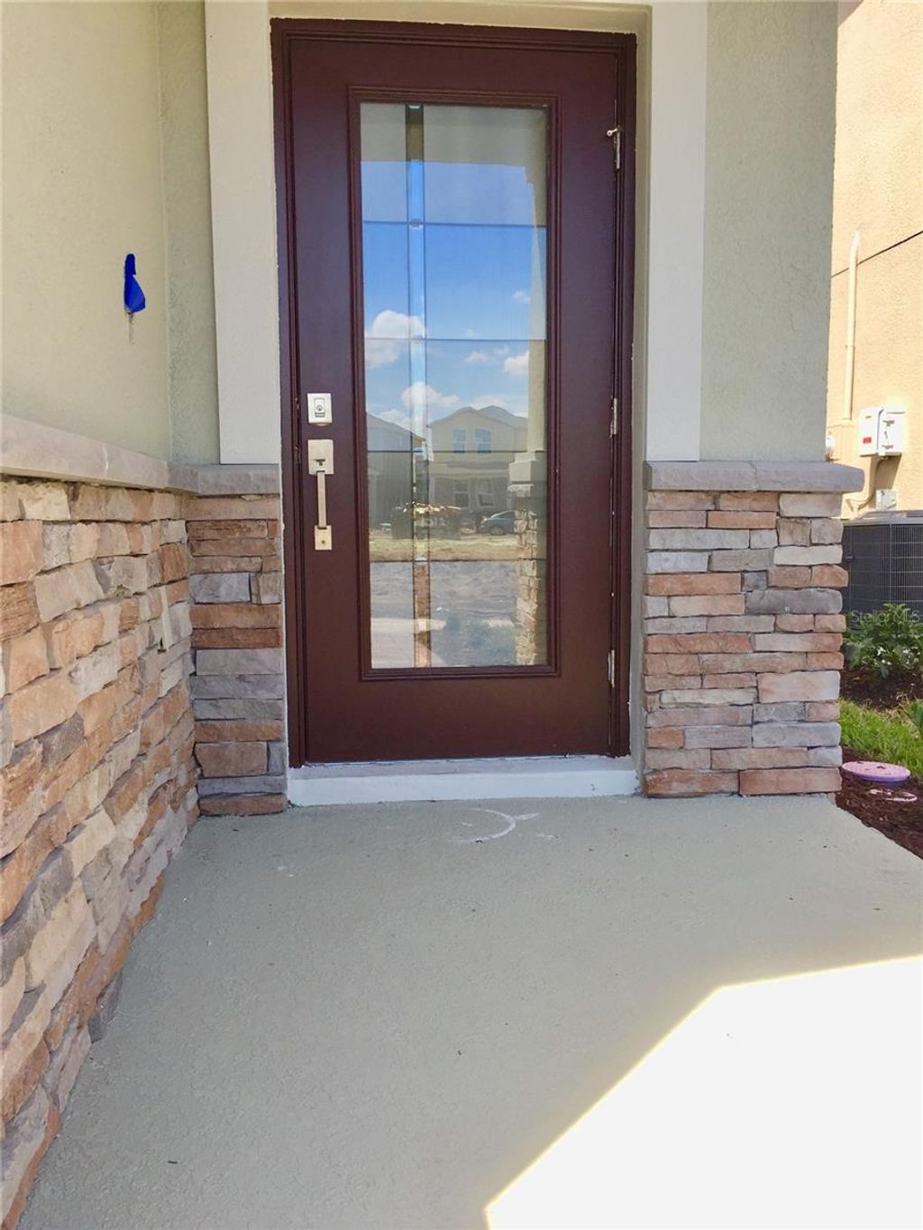 Photo of 12076 Theme Alley, Orlando, FL 32832 (MLS # O6387318)