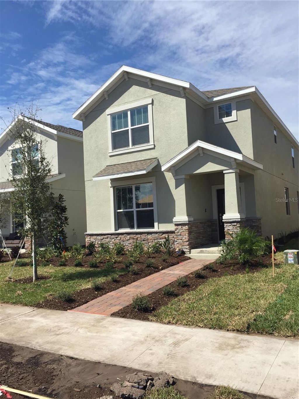 Photo of 12076 Theme Alley, Orlando, FL 32832 (MLS # O6387318)