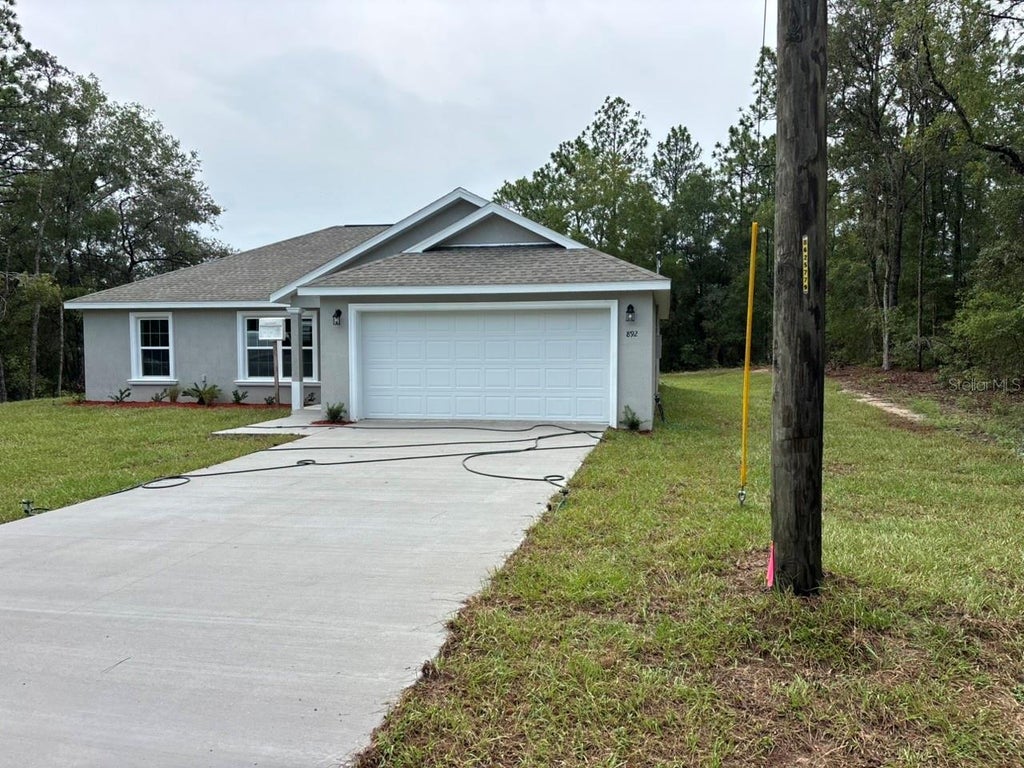 Photo of 892 W Cadima Place, Dunnellon, FL 34434 (MLS # G5115831)