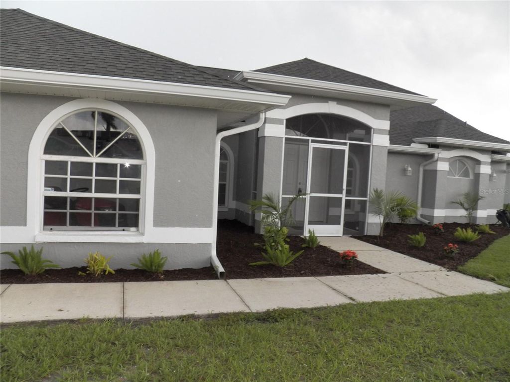 Photo of 23167 Turnbull Avenue, Port Charlotte, FL 33954 (MLS # C7511133)