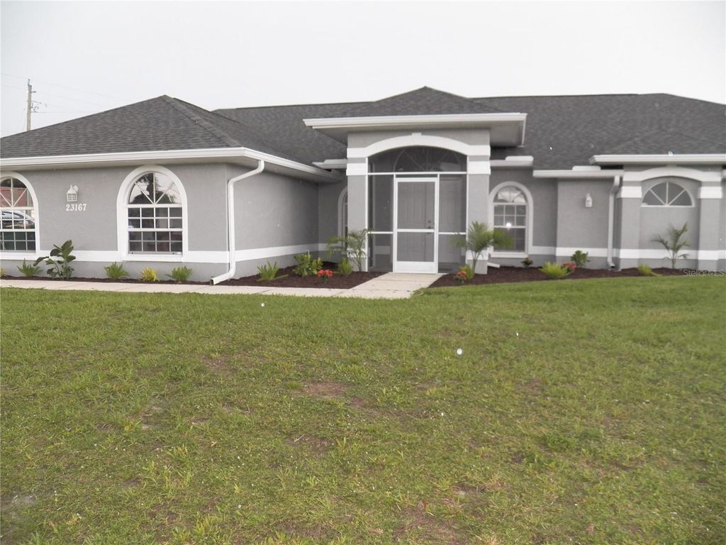 Photo of 23167 Turnbull Avenue, Port Charlotte, FL 33954 (MLS # C7511133)