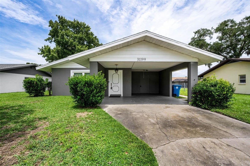 Photo of 31199 Lancewood Drive, Brooksville, FL 34602 (MLS # TB8536731)