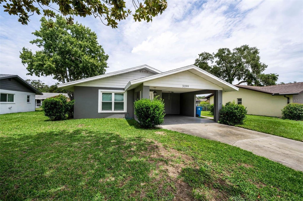 Photo of 31199 Lancewood Drive, Brooksville, FL 34602 (MLS # TB8536731)