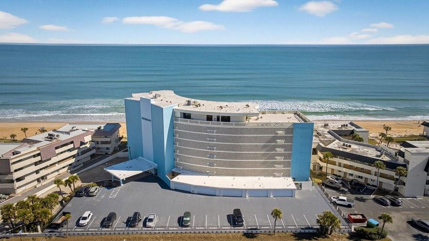 Stunning first-floor oceanfront condo located in the Shoreham in Ormond Beach on the desirable no-drive beach. This fully furnished, turnkey 2-bedroom, 2-bath residence offers direct ocean views overlooking the beach and oceanfront swimming pool with convenient beach access from the pool deck. The remodeled kitchen features quartz countertops, stainless steel appliances, and an open layout ideal for entertaining. Enjoy indoor-outdoor living from the private balcony with stairs leading directly to the lawn, pool, and beach. The Atlantic Ocean views are truly exceptional. Additional features include a secured storage closet and one assigned parking space in the underground garage. The Shoreham is conveniently located approximately 1.5 miles from Granada Blvd, providing quick access to shopping, restaurants, parks, and the Ormond Memorial Art Museum, while still offering an easy commute and a peaceful beachfront setting.  HOA fees include cable, internet, pest control, and building insurance. Ideal for full-time living, vacation use, or investment. Shell seeking, beachcombing, shore fishing, and sunbathing are just steps away from this must-see oceanfront condo.