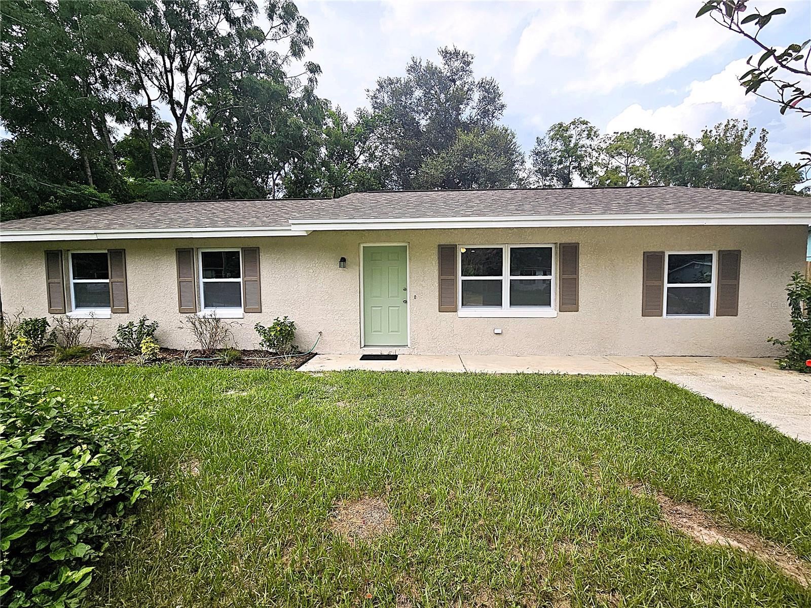 Get new house features without the new house price! Turn key move in ready home. Renovation just completed on this sturdy block constructed home. Open 4bed/2bath floor plan that offers split bedrooms and large open kitchen. Kitchen features NEW GRANITE COUNTERTOPS AND CABINETS, NEW STAINLESS APPLIANCES, and NEW SINK AND FAUCET. NEW ROOF installed in 2024. NEW AC SYSTEM and NEW WATER HEATER installed in 2025. Energy efficient upgrades include LED lighting throughout and NEW ENERGYSTAR DOUBLE PANE WINDOWS. All interior flooring is either NEW LAMINATE and NEW TILE FLOORS. Both baths feature NEW TILE SHOWER, NEW VANITY, and NEW EXHAUST VENT FAN. All interior doors are new with new door handles. NEW SEPTIC DRAINFIELD installed 8/2025. NO HOA OR CDD RULES OR FEES. Easy commuting to Tampa via I-75 exit 293 which is less than 4 miles away. Local fire station is located within .7 miles.