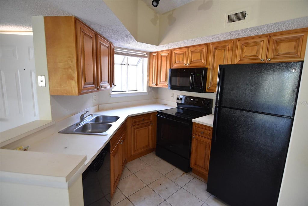Photo of 1932 Lake Atriums Circle #88, Orlando, FL 32839 (MLS # O6448041)