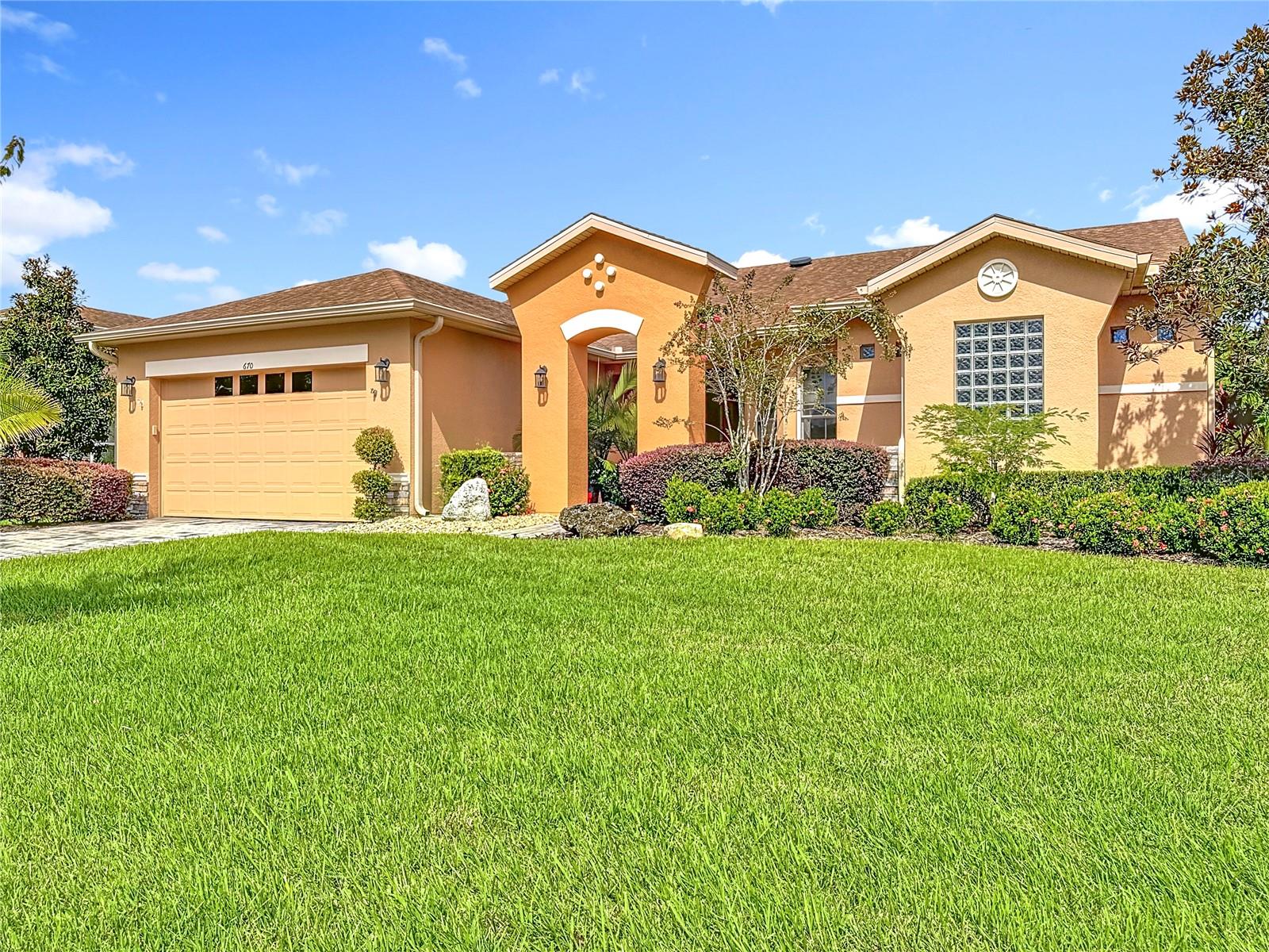 EXCELLENTLY MAINTAINED COCONUT GROVE model built in 2011 in the Vizcaya subdivision of Solivita. NEW ROOF to be installed 9/25. Home is approximately 500 yards from the PALMS REC CTR. HUGE $$ UPGRADE: RENEWAL by ANDERSEN windows & slider NEW in 2024. Two-Stage HVAC with Dehumidifier NEW in 2017. MORE UPGRADES: 8' doors, 5 1/2" BASEBOARDS & ROUNDED CORNERS throughout. 18" TILE in main living areas, PLANK TILE in the den. Carpet in the bedrooms. Kitchen features STAINLESS STEEL appliances including an INDUCTION cooktop with a CONVECTION & AIR FRYER oven, GRANITE counters, 42" upper cabinets with Crown Molding, PULL-OUT drawers in lower cabinets, RECESSED lights & a PANTRY. Den has a BUILT IN DESK with shelves. Florida Room has Recessed Lights and a side exit door with an Invisible Screen that leads to the lanai. RENEWAL by ANDERSEN Living Room slider has has two 4' glass panels that lead to the lanai. PRIMARY BEDROOM boasts 2 LARGE WALK-IN CLOSETS. Primary Bathroom includes a Garden Tub, Walk-In shower, DUAL VANITIES, Corian counters and GLASS BLOCK windows. 2nd Bathroom was upgraded with a walk-in shower, Acrylic walls and thicker glass door slider. Laundry Room has cabinets and is pre-plumbed for a wash basin. LARGE EXTENDED & SCREENED LANAI with has 2 REMOTE CONTROLLED SOLAR SHADES. GREEN BELT behind home. *See the FULL LENGTH VIDEO on Tour Link 1.** ***Solivita is an active adult 55+ community located in Kissimmee, Florida. It is approximately 50 minutes from Disney World & the Orlando International Airport. Solivita has a total of 5,470 homes. Approximately 10,000 - 11,000 people live in Solivita during the winter while approximately 7,500 live in Solivita during the summer. Enjoy your active years in this piece of paradise. Solivita's amenities include: - a manicured SOFTBALL diamond & field - 36 holes of CHAMPIONSHIP GOLF that can be played by joining the Stonegate Golf Club or paying as you go - 2 STATE of the Art AMENITY centers with updated exercise equipment, yoga studio & meeting rooms - 3 restaurants - 14 HEATED POOLS - 17 PICKLEBALL courts - 9 TENNIS courts - 4 BOCCE BALL courts - 4 SHUFFLEBOARD courts - 3 HORSESHOE pits - a BILLIARDS room - miles of bike paths - 2 DOG PARKS (Small & Large Dogs) - Corn Hole - Tot Lot PLAYGROUND - COMMUNITY GARDEN - over 250 resident clubs. The HOA: - maintains the LANDSCAPING & IRRIGATION systems in the common areas as well as at individual homesites - maintains the roads throughout the community - PROVIDES SECURITY with gate guards and mobile patrols including the Polk County Sheriff - allows AUTOMATED GATE ACCESS for residents via license plate readers - provides residents with Fiber Optic Internet & TV service.***Poinciana Lakes Plaza is a MAJOR NEW SHOPPING CENTER that opened directly across from the Solivita Main Gate in Summer of 2024. It features Sprouts Grocery, TJ MAXX, Ross, Burlington, Rack Room Shoes, 5 Below, Ulta, Outback, First Watch, 5 Guys, Urgent Care, Dentist, TD Bank, Petco & Hair Cuttery PLUS MORE TO COME.***