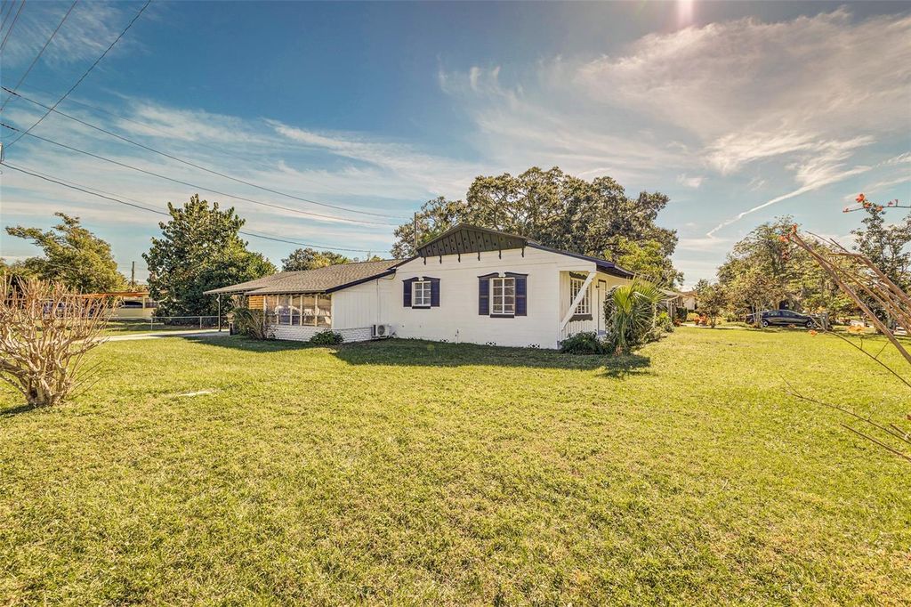 Photo of 561 N Dollins Avenue, Orlando, FL 32805 (MLS # O6364653)