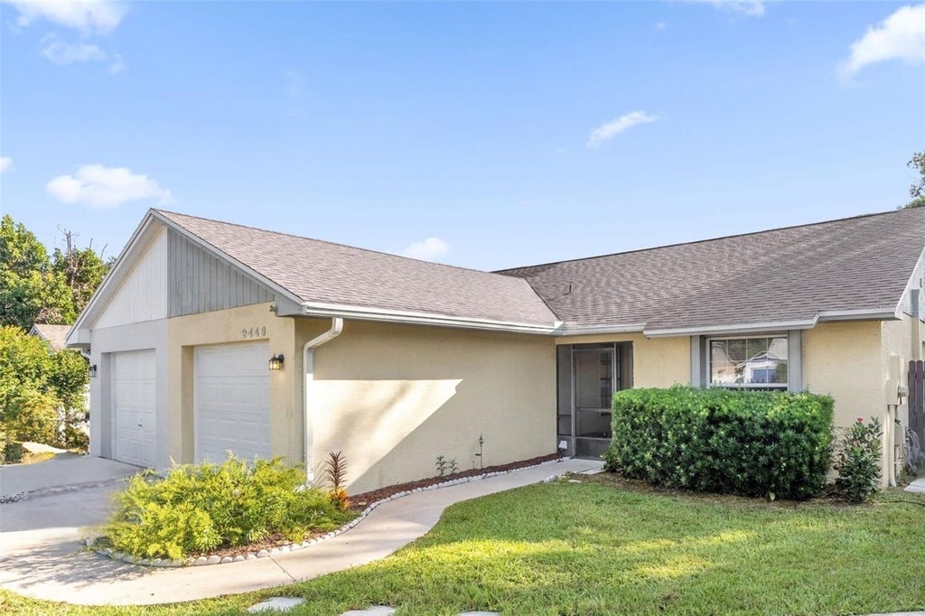 Photo of 2449 Long Meadow Way, Orlando, FL 32817 (MLS # O6451718)