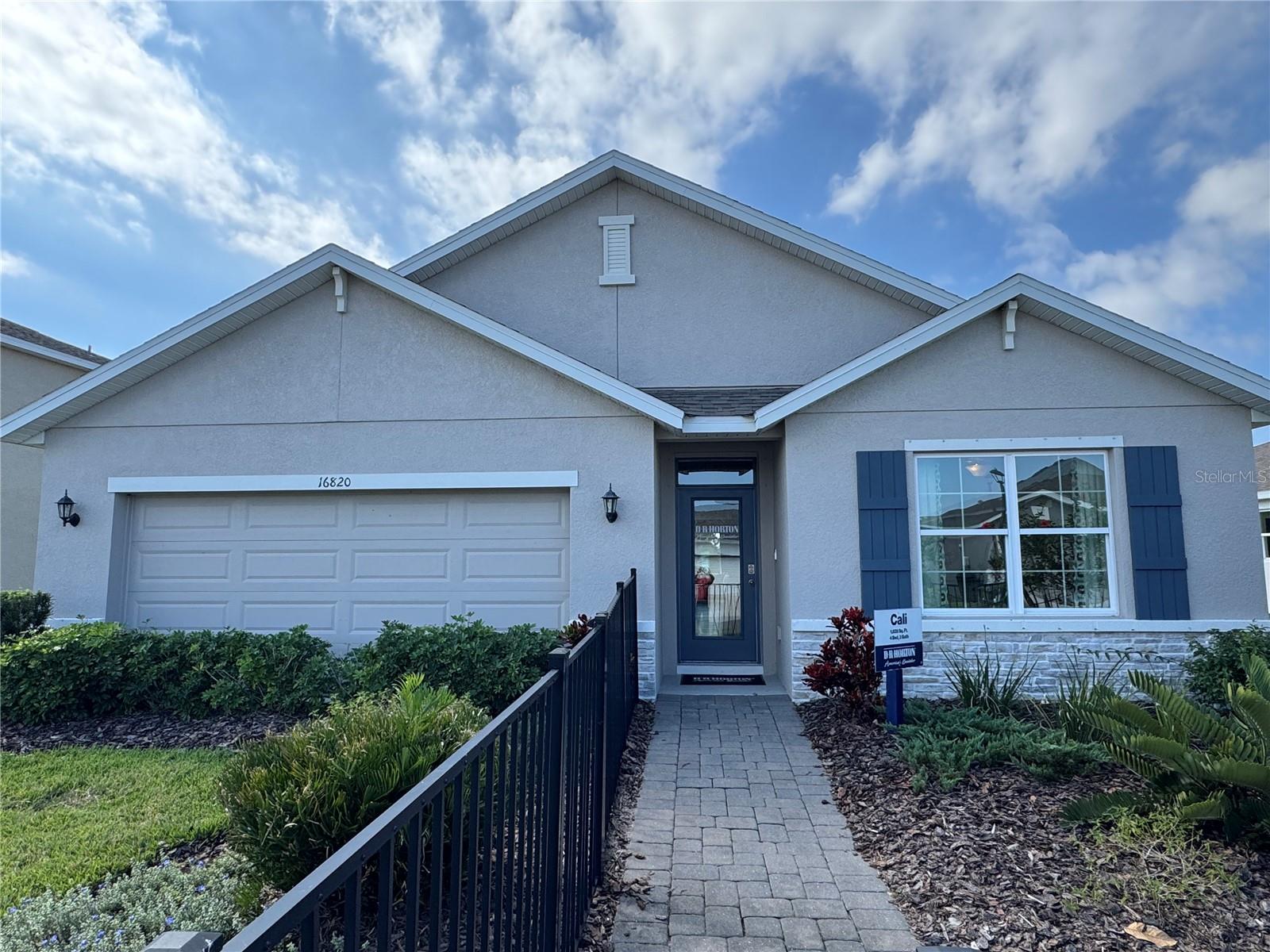 MOVE IN READY! REDTAG SALE: Receive up to $25,000 towards closing costs and special interest rates with the use of our preferred lender, now through October 19th. This all-concrete block constructed, one-story layout optimizes living space with an open concept kitchen overlooking the living area, dining room, and the outdoor covered lanai. The well-appointed kitchen comes with all appliances, including refrigerator, built-in dishwasher, electric range, and microwave. The owner's suite, located at the back of the home for privacy, has an ensuite bathroom. Two additional bedrooms share the second bathroom. The third bedroom is located near the laundry room, which is equipped with included washer and dryer. Pictures, photographs, colors, features, and sizes are for illustration purposes only and will vary from the homes as built. Home and community information including pricing, included features, terms, availability and amenities are subject to change and prior sale at any time without notice or obligation.