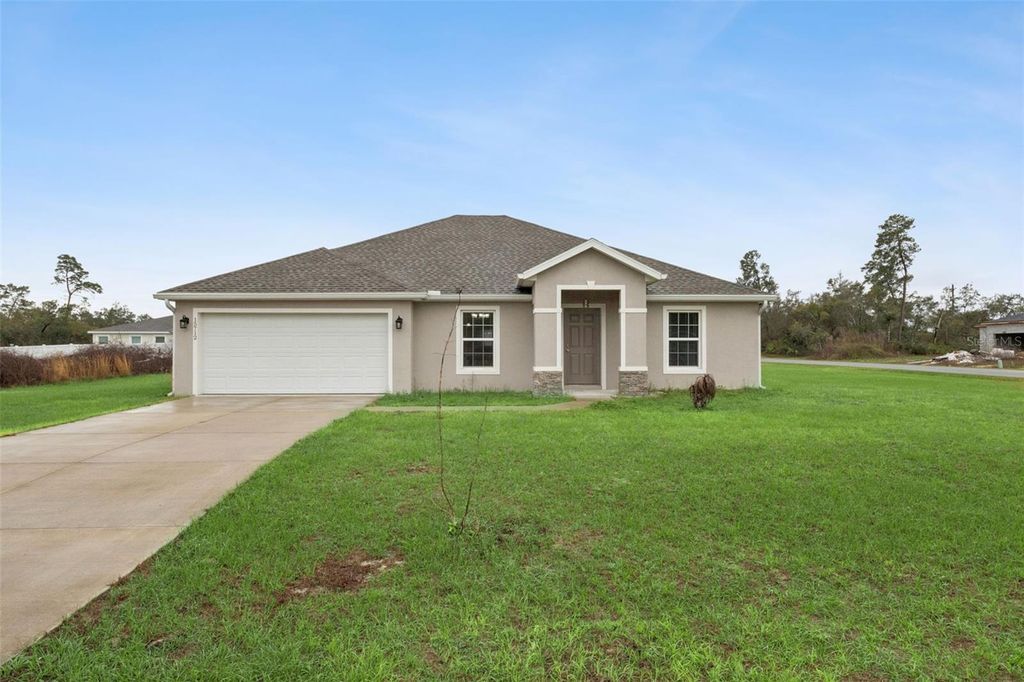 Photo of 15712 SW 37th Circle, Ocala, FL 34473 (MLS # O6391130)