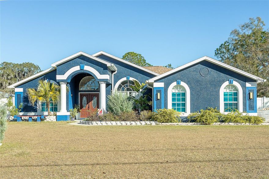 Welcome home to your own private slice of Florida. This spacious 5-bedroom, 3-bath residence sits on 1.25 acres and offers the lifestyle that’s getting harder to find: privacy, space, and true freedom with no HOA. Enjoy sunny afternoons and unforgettable weekends in your screened-in in-ground pool, perfect for relaxing or entertaining. Inside, you’ll find a functional layout with ceramic tile flooring, a well-equipped kitchen with included appliances, and comfortable bedrooms featuring walk-in closets. Recent updates add even more value, including a new water heater (05/2025), fresh interior and exterior paint, and a septic system recently serviced with the tank cleaned 6 months ago and the septic pump replaced approximately 6 months ago. Conveniently located in Wesley Chapel near everyday essentials, this is a unique opportunity you don’t want to miss. Schedule your showing today!