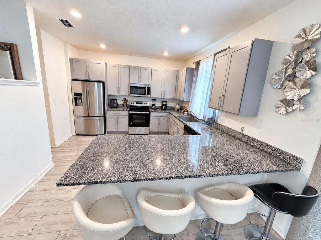 Photo of 2756 Meadow Stream Way, Clermont, FL 34714 (MLS # O6443394)