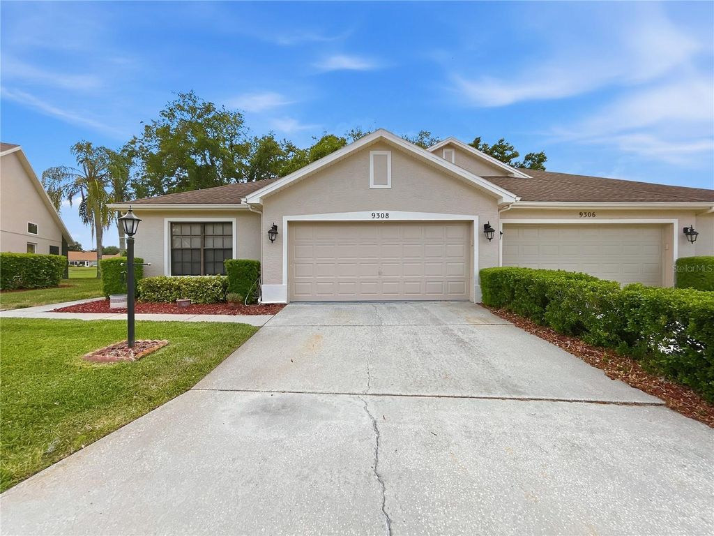 Photo of 9308 Whispering Meadow Court, New Port Richey, FL 34655 (MLS # W7885167)