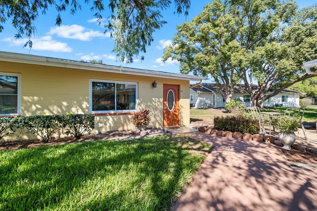 Photo of 401 Dorchester Place #61, Sun City Center, FL 33573 (MLS # TB8488233)