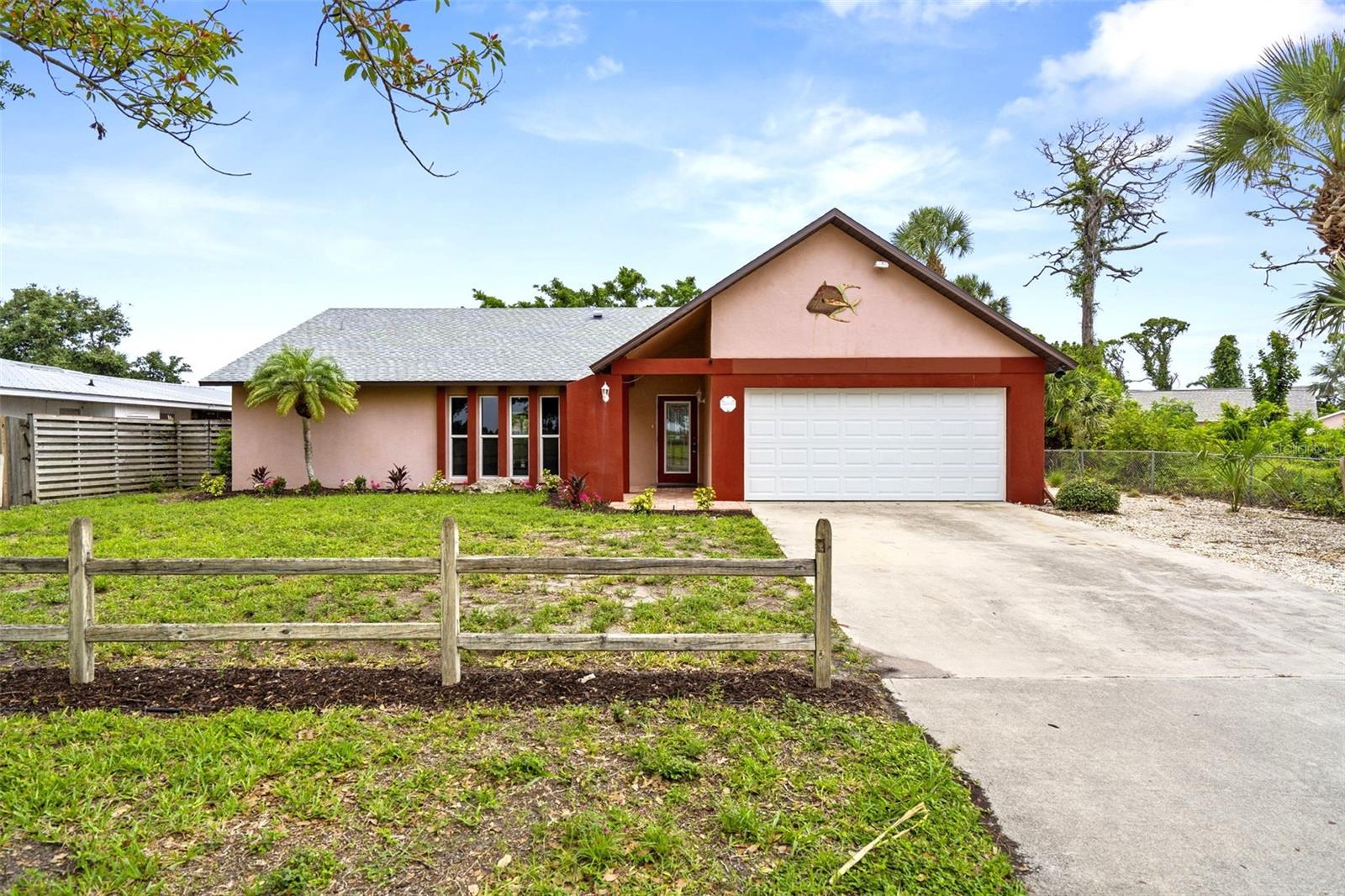 Unique 1/3 acre property on the Island of Venice, stretching from Beach Road to Shore Road, in the desirable Gulf Shores neighborhood, with deeded beach access right at the end of the street! Located in lower-risk Flood Zone X (no flood insurance required) and no HOA. Many UPGRADES (ask for Feature Sheet for a full list). Recent HIGHLIGHTS: New pool cage (2025), new electrical panel, ready for generator hook-up (2024), roof and hot water heater (2022), HVAC (2019), new range (2024), dishwasher and fridge (2023), washer/dryer (2021) and hurricane impact windows/door (2017). This lovely two-bedroom, two-bath home offers the ultimate Florida lifestyle. Enjoy year-round relaxation and entertaining by the private pool with brand new cage. Find your Zen by the serene backyard pond with waterfall. Or bike or golf cart to Historic Downtown Venice restaurants, shopping, beaches and amenities. Private, split floorplan. Spacious living room and a separate family gathering room with a cozy fireplace. High ceilings with exposed beams, porcelain tile throughout (installed 2024), updated guest bath. Primary is ensuite with walk-in closet. 2nd bedroom is also ensuite, with built-ins that provide full flexibility to use for guests or as a home office. Mature fruit trees like avocado and Meyer lemon in your own yard! The Gulf Shores neighborhood offers two deeded access beach access points for $50/year as well as social activities. Don't miss this one-of-a-kind coastal gem!