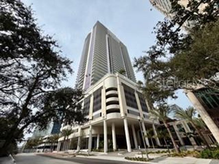 Luxury Urban Living at Art House | Downtown St. Petersburg. 
Welcome to Art House, the newest jewel of downtown St. Petersburg, a sleek, contemporary 42-story luxury condominium tower rising above one of Florida’s most vibrant urban neighborhoods. Designed by world-renowned Architects with implacable interior amenity spaces, Art House embodies modern sophistication, artistic expression, and resort-style living right in the heart of the city.
This stunning 2-bedroom, 2½-bath condo is located in one of the most desirable addresses downtown, just walking distance to:
• Waterfront parks and scenic Tampa Bay
• Trendy restaurants, cafes, and nightlife
• World-class museums, galleries, and cultural venues
• Boutique shopping, art studios, and performance spaces
Featuring floor-to-ceiling glass windows, open-plan living spaces, and a private terrace with sweeping views of the city skyline, this residence is designed to bring the beauty of the outdoors in.
Unrivaled Amenities “Cloud 9” & Beyond
Art House delivers a complete lifestyle experience with an extraordinary suite of amenities crafted for wellness, socializing, entertainment, and convenience. The building’s amenity floor, dubbed Cloud 9, located on the entire 9th level, is a resident-exclusive oasis of luxury living.
Outdoor & Social Spaces:
• Resort-style pool deck with expansive water views
• Private cabanas and comfortable poolside seating
• Fire pit lounge perfect for social evenings under the stars
• Barbecue stations & casual seating areas for gatherings
• Outdoor fitness terrace with panoramic city views
• BBQ grills and seating areas for alfresco entertaining
Fitness & Wellness:
• State-of-the-art fitness center with dedicated yoga and spin spaces
• Private training room for one-on-one workouts
• Spa retreat featuring steam room, sauna, and treatment spaces
• Outdoor fitness terrace for fresh-air workouts
Entertainment & Socializing:
• Game room with advanced simulators
• Private theater room with plush seating
• Club room with bar & catering kitchen
• Lounge areas for casual gatherings and events
Work & Everyday Convenience:
• The Hub — dedicated coworking space with:
• Communal work areas
• Private and semi-private work pods
• Conference room and meeting space
• Beverage bar for residents and guests
Guest Services:
• Fully furnished guest suites for fee and limited use
• 24-hour staffed lobby and lifestyle director to coordinate events and services
• On-site property management, valet, and secure access control
Other Distinctive Features:
• Grand circular arrival plaza 
• Two-story art-infused grand lobby with gallery spaces
• Private resident entrance and high-speed elevators
• Secure covered parking garage with valet or self-park options
• High-speed Wi-Fi in all amenity spaces
Downtown Living at Its Finest:
Art House delivers an unbeatable live-work-play lifestyle, where Downtown St. Petersburg is literally your backyard. From the vibrant arts scene and waterfront festivals to chef-driven dining, boutique shopping, and cultural events, everything you love about urban Florida living is right outside your door.