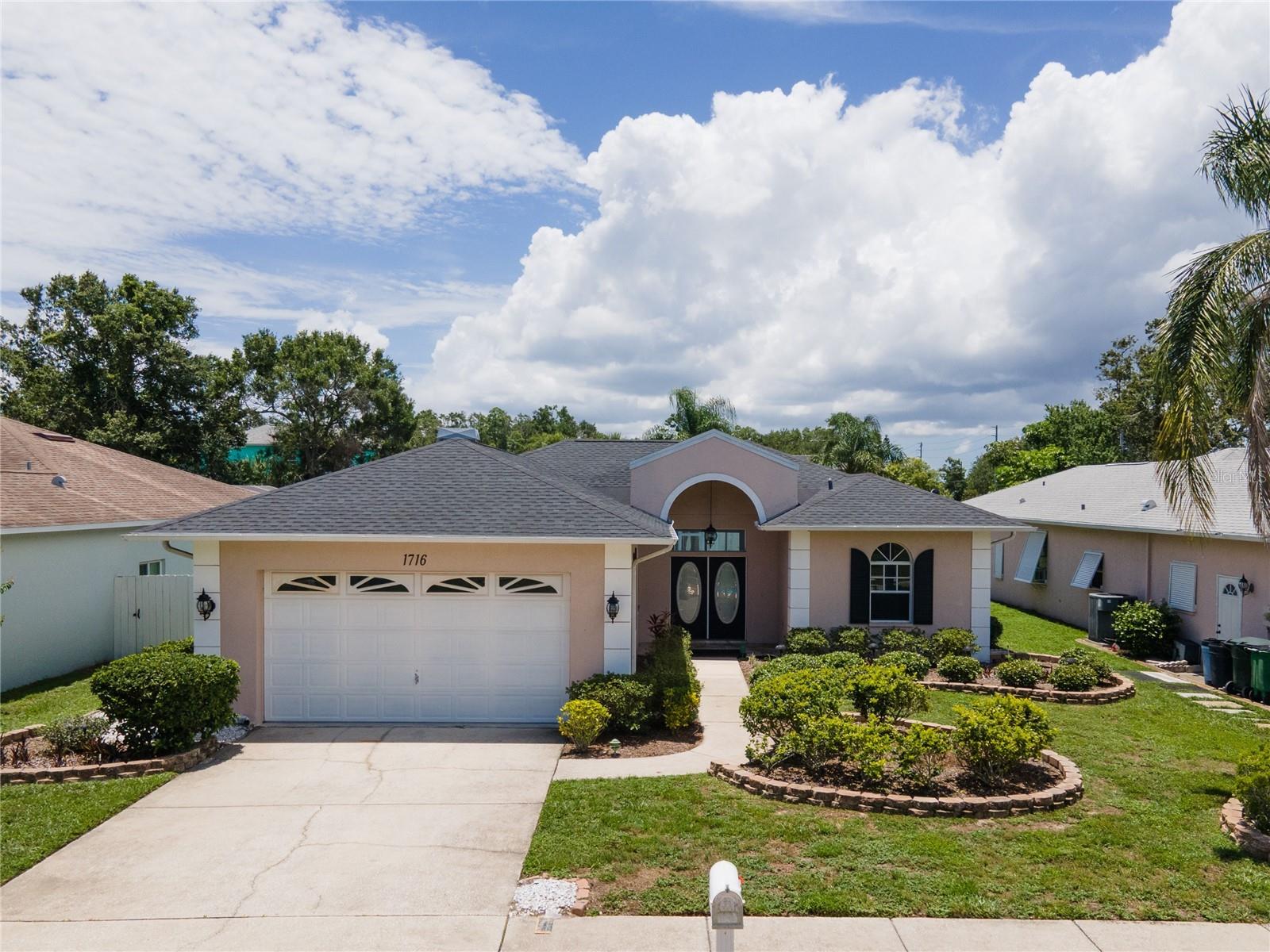 Welcome to Your Dream Oasis in Safety Harbor!
Discover the perfect blend of modern elegance and Florida charm at 1716 Bermuda Ct, a beautifully renovated pool home tucked away on a quiet cul-de-sac in the heart of Safety Harbor.
Step inside to a bright, open-concept floor plan featuring gleaming marble-look tile throughout, soaring ceilings, and abundant natural light. This home has been extensively updated with all-new plumbing, new electrical wiring, new recessed lighting throughout, a brand-new HVAC system, and a new water softener — providing complete peace of mind and comfort for years to come.
The gourmet kitchen is a true showstopper with custom navy blue and crisp white cabinetry, luxurious quartz countertops, high-end stainless steel appliances, double wall ovens, a convenient pot filler, and designer pendant lighting — perfect for everyday living and entertaining guests in style.
Retreat to the spacious master suite featuring a luxurious spa-inspired bathroom with dramatic floor-to-ceiling tile, a rainfall shower, dual modern vanities with LED mirrors, and a stand-alone soaking tub beneath an elegant arched window — your own personal sanctuary.
Multiple sliding glass doors connect the interior living spaces to the screened lanai and sparkling private pool, surrounded by lush tropical landscaping — an ideal spot for lounging, grilling, and enjoying Florida’s beautiful weather year-round.
Additional highlights include a two-car garage, mature landscaping, and a fantastic location just minutes from charming downtown Safety Harbor, waterfront parks, local restaurants, top-rated schools, and the gorgeous Gulf beaches.
Key Highlights:
NEW ROOF (2020)
All-new plumbing, electrical, recessed lighting, HVAC, and water softener
Fully updated interior with luxury finishes
A dedicated full-size office provides the perfect work-from-home setup and can easily be converted into a fourth bedroom to accommodate guests or growing families.
Designer kitchen with high-end appliances and custom cabinetry
Spa-style master bath with soaking tub & rainfall shower
Bright, open layout with high ceilings and modern details
Screened lanai & private pool oasis for outdoor living
Quiet cul-de-sac in highly sought-after Safety Harbor
Don’t miss this incredible opportunity to own a move-in ready showpiece — schedule your private tour today and fall in love with 1716 Bermuda Ct!