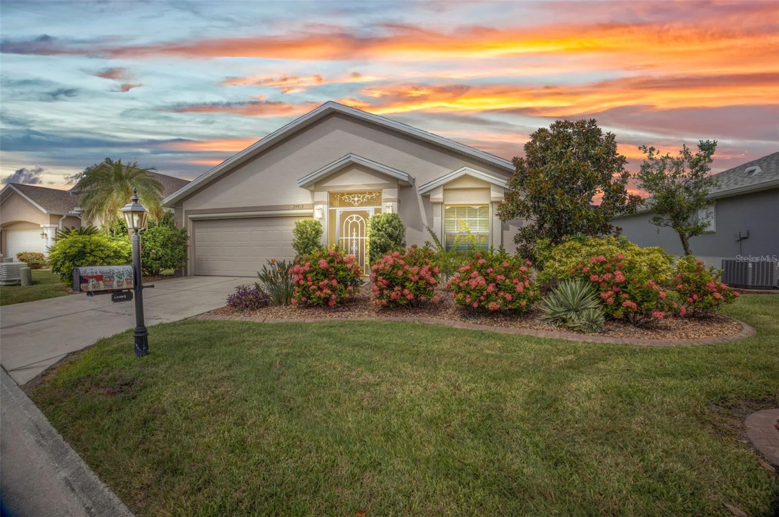 SENSATIONAL Sheffield model with EXTENDED LANAI that is enclosed and tiled in the gated golf course/active resort of highly desirable Kings Gate, a 55+ community that IS NOT in a flood zone and is in evacuation zone d (never been ordered to evacuate). This well cared for home has a 2021 Roof, 2016 AC and 2020 HWH in addition to accordion shutters. GORGEOUS curb appeal greets you as pull up to this home - step inside and your eyes will first notice a rather spacious living room before looking further to that EXTENDED LANAI which also has a paver patio connected to it. Great options for entertaining and/or relaxing. Living room and lanai interact nicely with the kitchen. Master Bedroom in the back left of the home and guest bedroom in the front right of the home provide plenty of privacy for both you and your guests. Generous size den. Laundry inside with side by side washer and dryer. And if you haven't been to Kings Gate before - you're going to love the options for activity (Olympic size heated swimming pool and spa, tennis courts, pickle ball, lawn bowling, shuffle board, bocce, horseshoes, gym, billiards, library, euchre, bingo, bridge, Texas hold em, poker, mahjong and more). The onsite AND NEWLY REMODELED Lions Den restaurant and bar is super convenient and also offers Tuesday night Karaoke and monthly trivia contests. Many residents love the fact that they are just a golf cart ride away from the shopping plaza that provides you access to grocery store (ALDI), drug store, bank, restaurants and shopping. Want to explore outside of Kings Gate – you are minutes away from the restaurants and shops of downtown Punta Gorda and Fisherman's village. And if you want to explore more of Florida's fun spots you’re near I75 to quickly head north or south. An AWESOME home with a SENSATIONAL EXTENDED and ENCLOSED LANAI with zen like paver patio in a PREMIER gated community needs to be on your list. Call today for a private showing and a golf cart tour of the community/amenities.