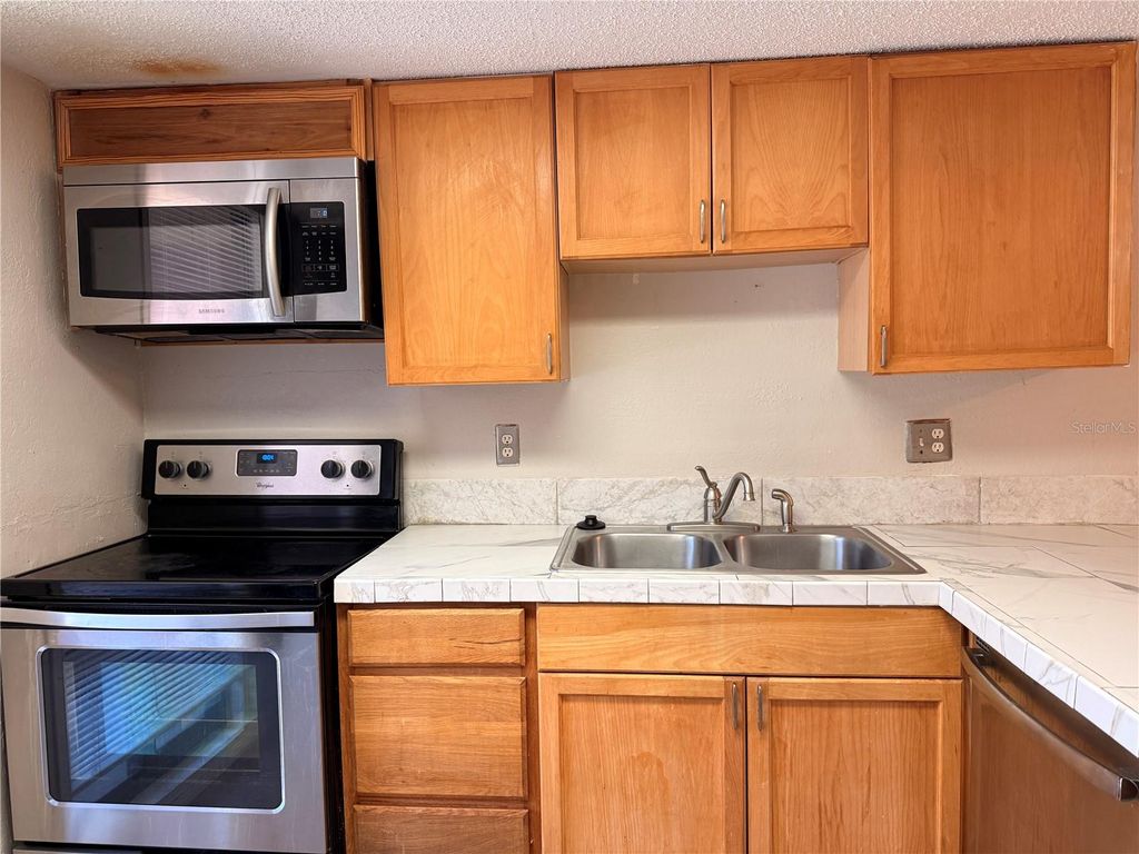 Photo of 407 Sheoah Boulevard #13, Winter Springs, FL 32708 (MLS # O6380890)