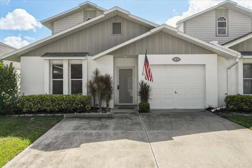 Photo of 13730 Downing Lane #W-1, Fort Myers, FL 33919 (MLS # A4702514)