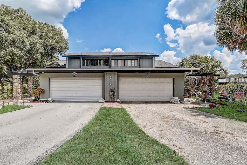 Photo of 32 Nottingham Way, Haines City, FL 33844 (MLS # O6422315)