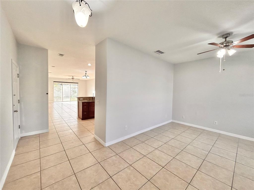 Photo of 4930 Soft Rush Street, Orlando, FL 32811 (MLS # O6380002)