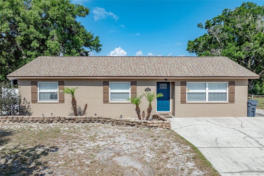 MAKE YOUR APPOINTMENT NOW TO VIEW THIS WELL-MAINTAINED & UPDATED HOME .  THIS IS A THREE BEDROOM, TWO BATH HOME. THE  KITCHEN AND BOTH BATHS HAVE BEEN UPDATED.  LAMINATE AND TILE IS THROUGHOUT THE RESIDENCE.  THE KITCHEN BOASTS WOOD CABINETRY, GRANITE COUNTER TOPS AND STAINLESS STEEL APPLIANCES.  THE LIVING ROOM IS LARGE WITH A BEAMED VAULTED CEILING AND DOUBLE FRENCH DOORS THAT LEAD TO THE SCREENED REAR PORCH.  THE PRIMARY BEDROOM HAS A HUGE ENSUITE BATH WITH LOADS OF STORAGE.  THERE ARE  BEAUTIFUL SHUTTERS ON ALL THE WINDOWS FOR THE NEW OWNERS.  THE ROOF WAS DONE IN 2025.  THE EXTERIOR OF THE HOME WAS PAINTED IN 2025 AND A NEW A/C WAS INSTALLED IN 2018.  THERE IS A LARGE SOLAR HOT WATER HEATER--PANELS HAVE BEEN " PAID OFF " BY THE SELLERS.  THE REAR YARD IS FENCED AND HAS A LARGE (13X11) AIR CONDITIONED SHED THAT CAN BE AN OFFICE, RETREAT, EXTRA TV ROOM, MAN CAVE OR SHE SHED--WHATEVER YOU WANT.  NO HOA.