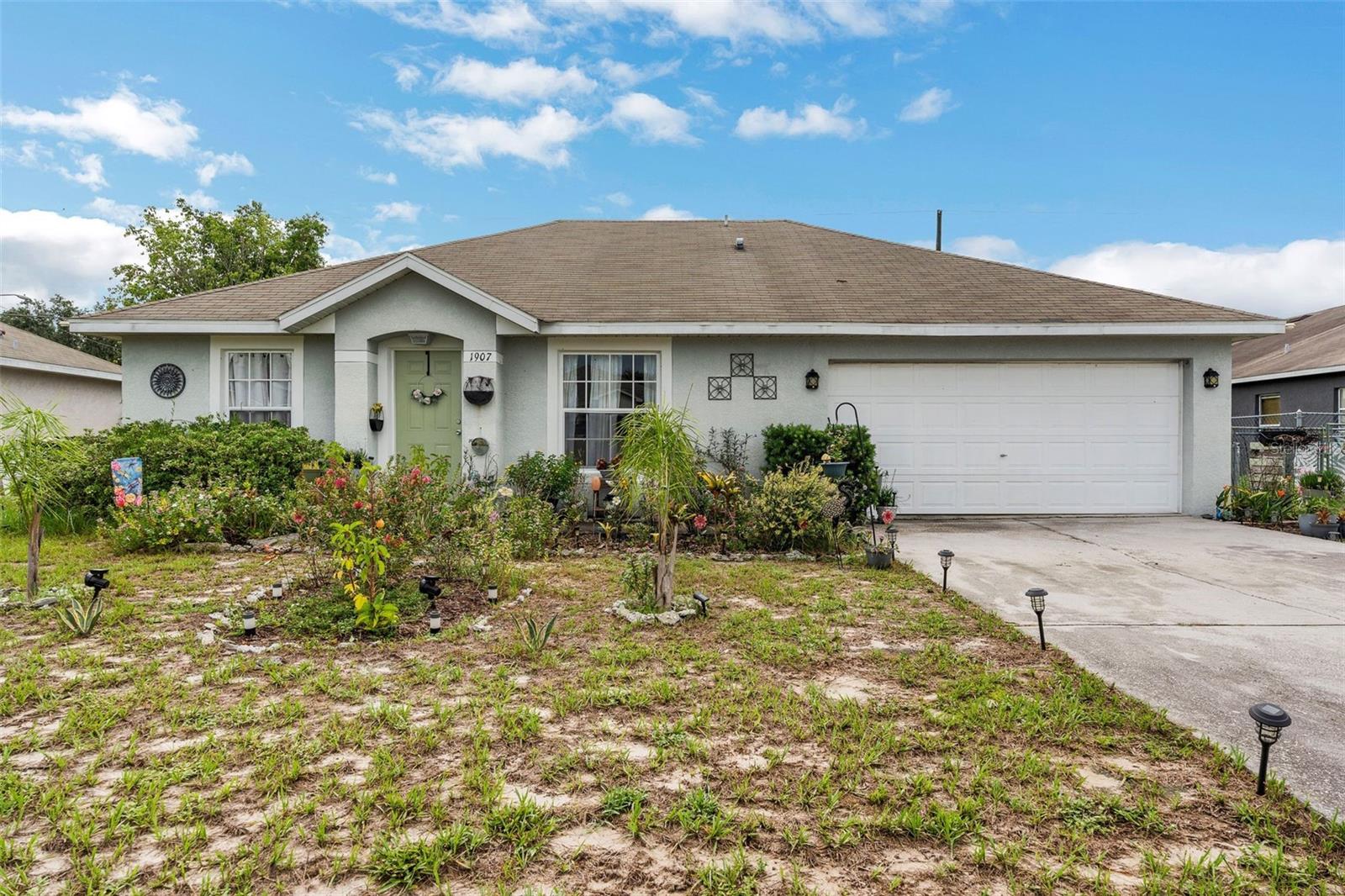 SELLER MOTIVATED!!Welcome to your new home! This charming residence nestled in the growing neighborhood of Poinciana, Florida has three bedrooms, two bathrooms, an open floor concept with vaulted ceilings which makes it feel spacious. The garage is being used as a cozy retreat with AC however nothing is permanently installed and can be used as a car garage at any time! The home has a huge backyard fenced in with plenty of space for entertaining and growing your own fruits and veggies which is already started with Papaya, Mango, Cherry and Lime trees just to name a few! Schedule a showing today and see for yourself why this is the home for you!