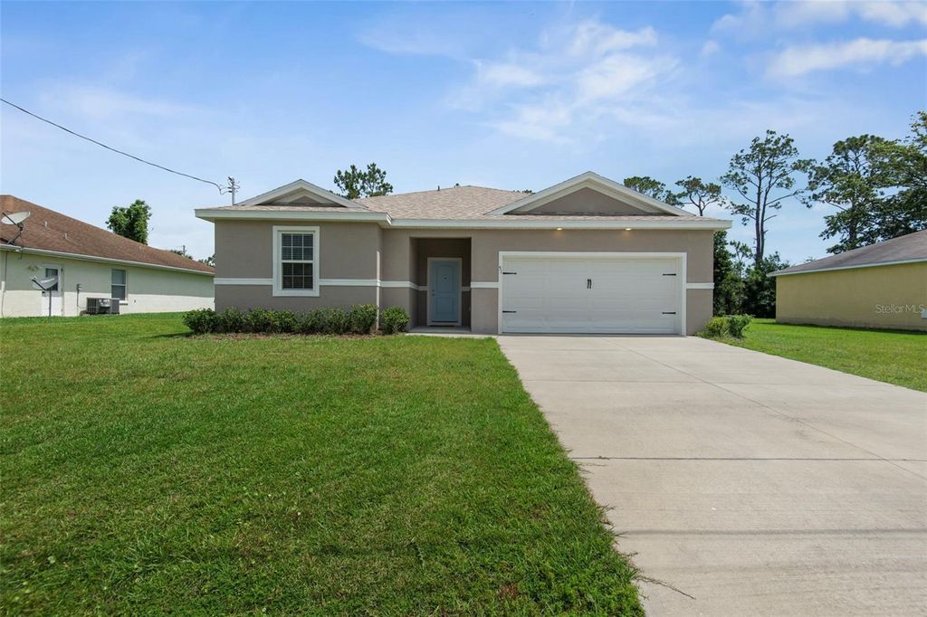 Photo of 51 Royal Oak Drive, Palm Coast, FL 32164 (MLS # FC318770)