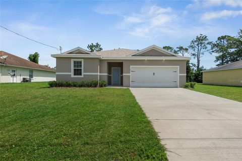 Photo of 51 Royal Oak Drive, Palm Coast, FL 32164 (MLS # FC318770)
