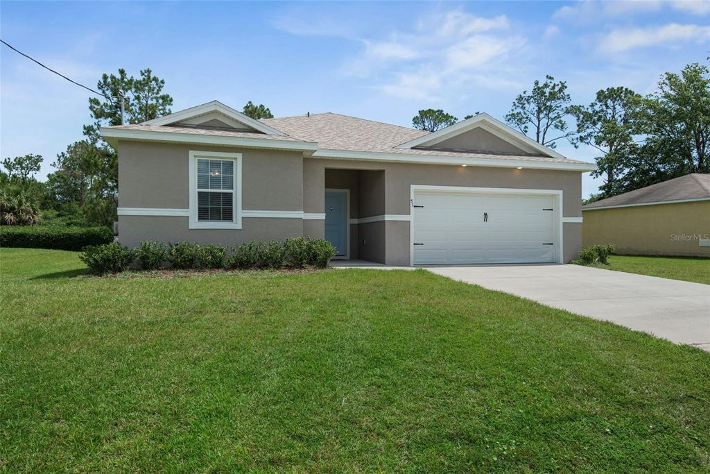 Photo of 51 Royal Oak Drive, Palm Coast, FL 32164 (MLS # FC318770)