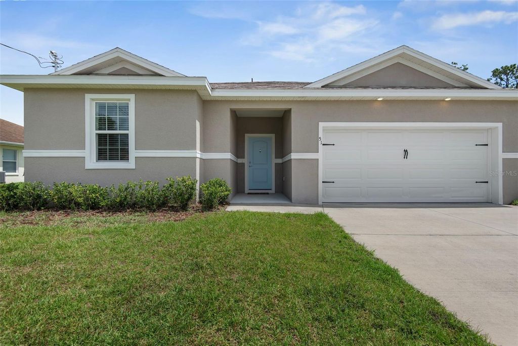 Photo of 51 Royal Oak Drive, Palm Coast, FL 32164 (MLS # FC318770)