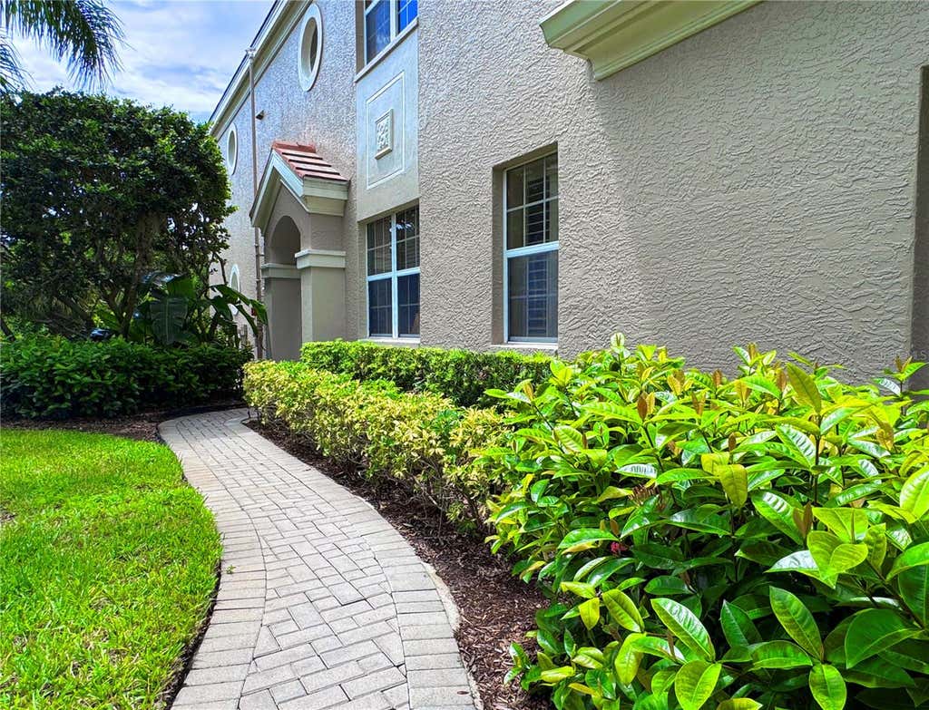 Photo of 7434 Botanica Parkway #101, Sarasota, FL 34238 (MLS # A4702480)