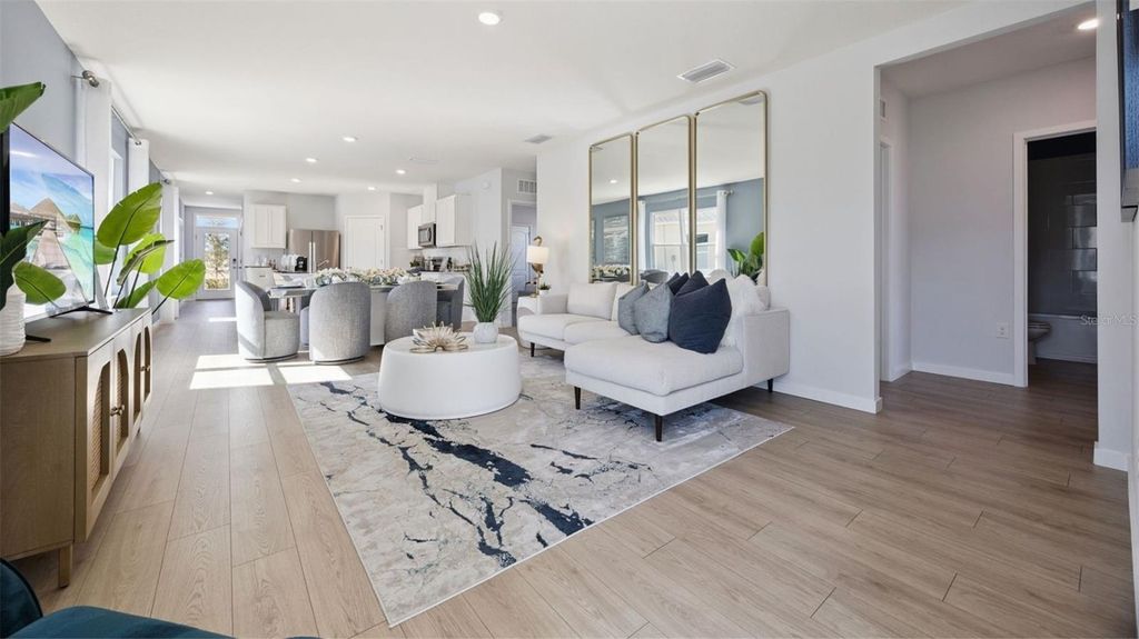 Photo of 1369 Camellia Bloom Lane, Sanford, FL 32773 (MLS # O6387595)