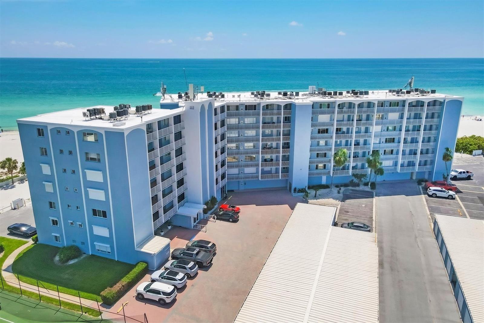 Welcome to your slice of paradise on the breathtaking shores of Anna Maria Island! This beautifully appointed 2-bedroom, 2-bath rare end unit beachfront condo is nestled along the sparkling blue waters of the Gulf of Mexico, offering the ultimate in island living.
Enjoy stunning sunset views or morning coffee from your private lanai overlooking the Gulf. The spacious open-concept living and dining area is perfect for entertaining or simply relaxing with the sound of the waves. The split floor plan ensures privacy, with the master suite featuring panoramic views of both the Island and the Gulf, a private en suite bath, and generous closet space. The large second bedroom offers beautiful views of the island and bay, and the unit includes a private 1-car garage.
Step outside and you're just moments from the beach via a private entrance, or enjoy the beachfront community pool with a private walkway for effortless access to Holmes Beach. The community also features a clubhouse and tennis courts, adding to the resort-style amenities.
Located in the heart of the island, you're within walking distance of charming boutique shops and local dining. Explore the island on golf carts, scooters, bikes, or even paddleboards and kayaks—all available to rent nearby.
Beyond your doorstep, enjoy multiple stunning beaches including Bradenton Beach, Manatee Public Beach, Bean Point Beach, and the popular Coquina Beach, which hosts a beach market every Wednesday, Friday, and Sunday from 10 a.m. to 2 p.m. Just a golf cart ride away is Bridge Street, a lively spot with beachfront dining, live music, quaint Island shops and the beachfront Moose Lodge with the largest member base in the country.
Take a leisurely 20-minute coastal ride through the charming, beachy vibes of Longboat Key and discover the iconic St. Armands Circle—home to world-class shopping, dining, and vibrant island atmosphere.
This is Florida Gulf Coast living at its finest. Don’t miss your opportunity to own a beachfront gem in one of the most desirable locations on the west coast of Florida!