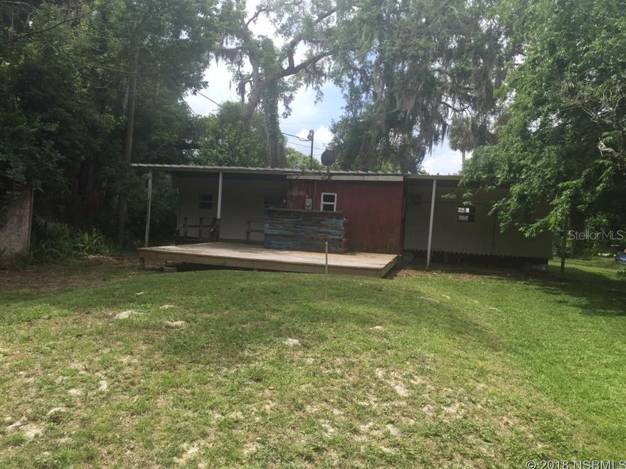 Mobile home on city lot in town close to everything2 bedroom 1 bath large yard new carpet and flooring new paint, nice deck large yard