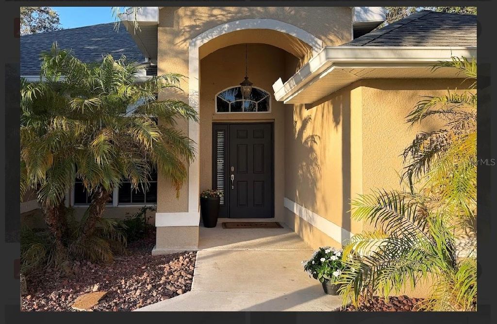 Photo of 14474 Mcgraw Avenue, Port Charlotte, FL 33953 (MLS # A4676653)