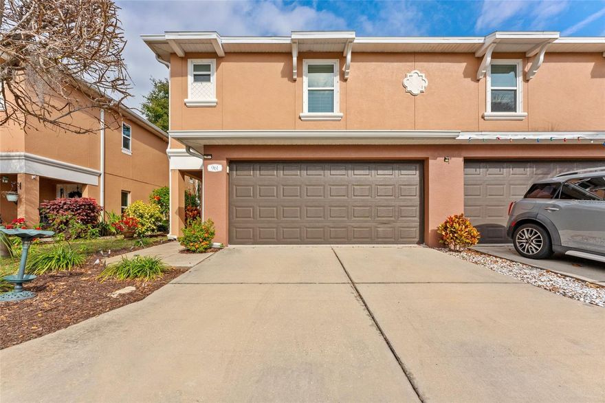 Welcome to this spacious and cheerful three-bedroom townhome in Brittany Park, ideally located in the heart of Tarpon Springs. Nestled on a conservation-like lot, this home truly checks all the boxes. The open floor plan is perfect for cozy nights in or entertaining friends. Downstairs, the kitchen overlooks the living room and features an eat-in area, creating a welcoming and functional space. A convenient half bath for guests, tile flooring on the first level and luxury vinyl flooring on the secondary level add both style and practicality. All bedrooms are located upstairs, along with a laundry closet for added convenience. The oversized primary suite offers a private en suite bath with a double vanity and a large walk-in shower with dual fixtures on each side creating a true spa like experience. The secondary bedrooms share a full bathroom and provide comfortable, versatile living space. Step outside to enjoy the backyard deck, which overlooks expansive acreage with no rear structures, offering exceptional privacy. This home also features a two-car garage and abundant closet storage throughout. Close to downtown Tarpon Springs, downtown Palm Harbor and our beautiful beaches!